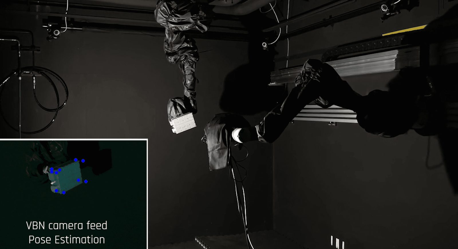 Rendezvous and proximity operations testbed with a vision-based navigation camera feed and pose estimation overlay.
