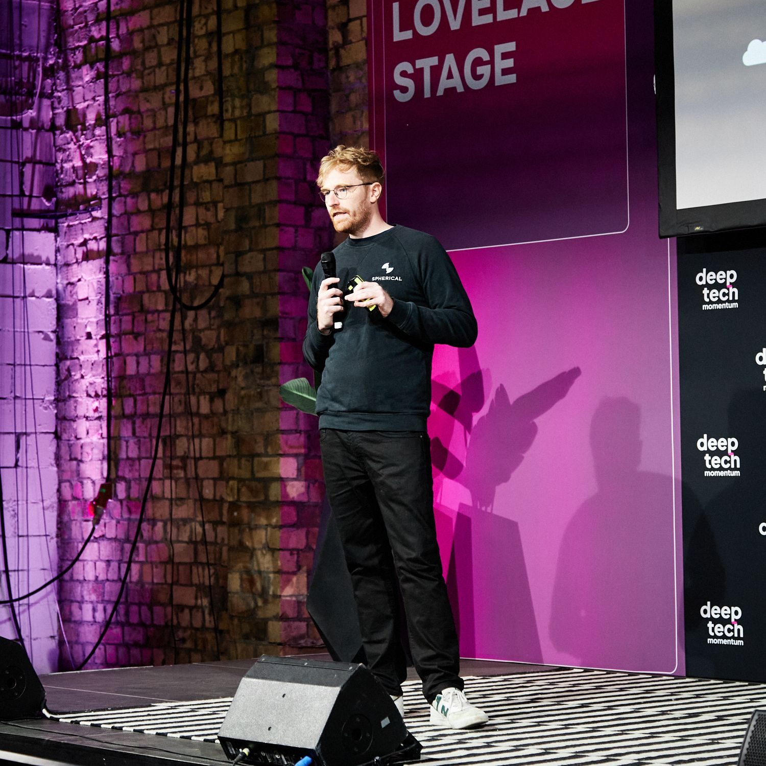 A Spherical team member presenting on the Lovelace Stage at Deep Tech Momentum 2025 in Berlin.