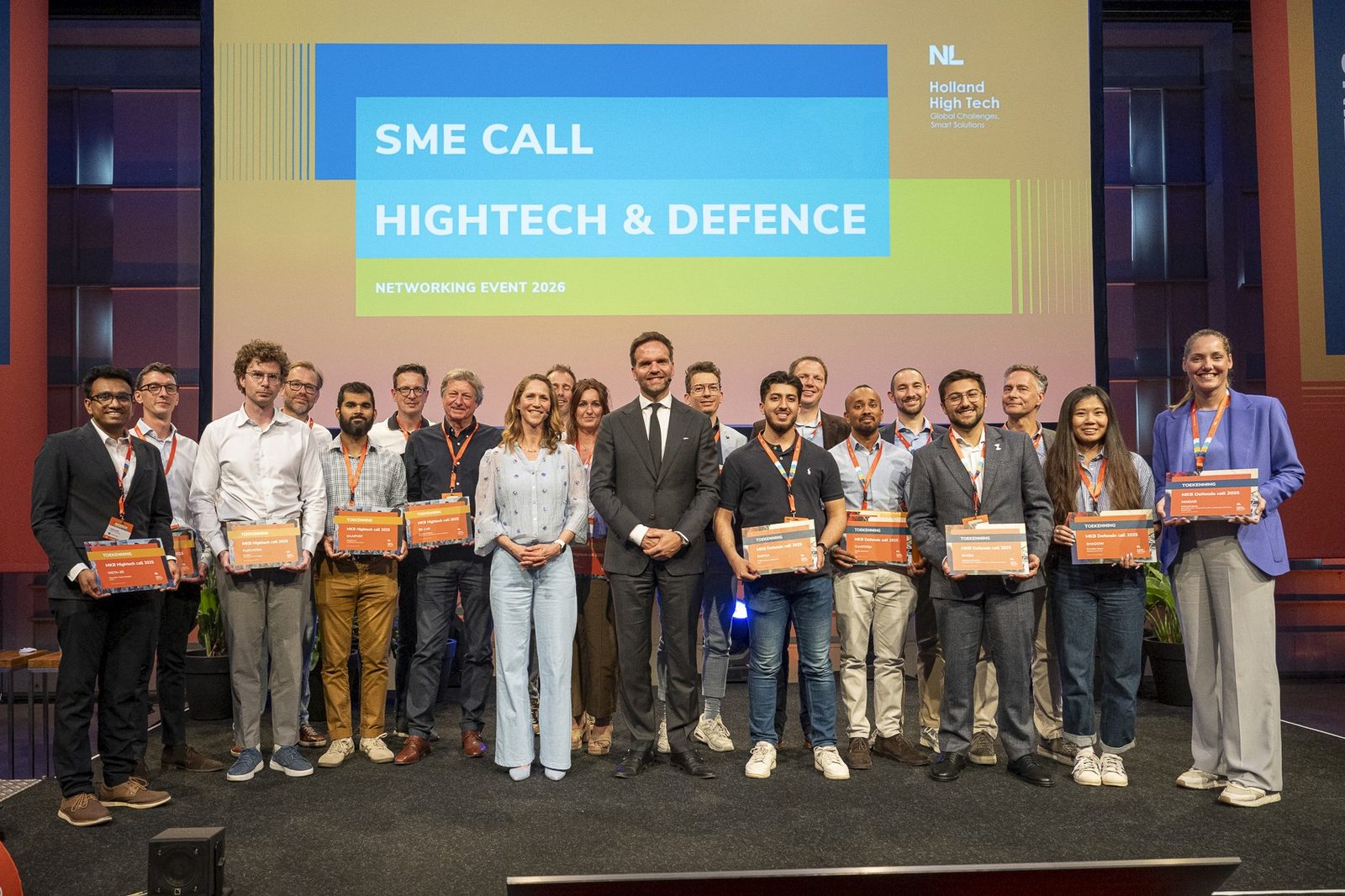 Spherical and other recipients on stage at the Holland High Tech MKB Defensie Call 2025 award ceremony.