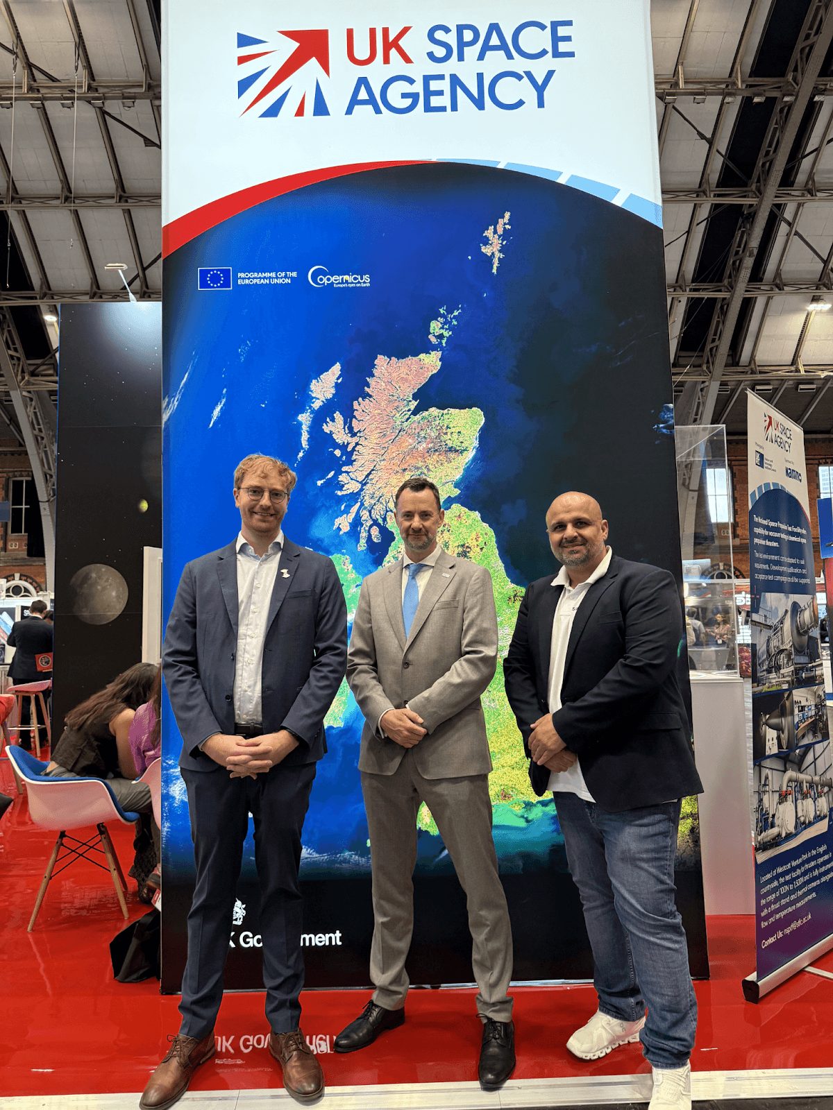 Spherical representatives at the UK Space Agency stand at the UK Space Conference in Manchester.